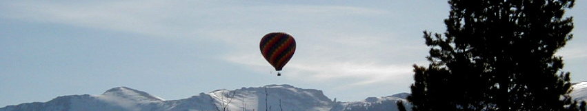 A balloon Graces the Sunrise over the Continental Divide